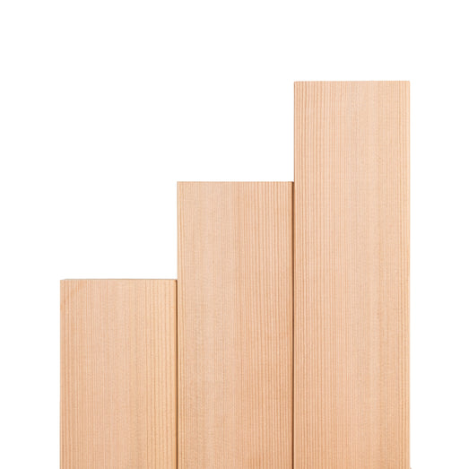 Western Red Cedar 2x4 bench boards in stepped lengths, standing upright side by side, showing straight face grain