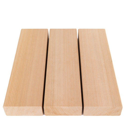 Three Western Red Cedar 2x4 bench boards side by side from above, showing parallel grain and square ends