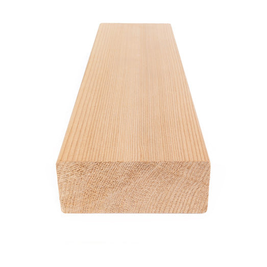 Western Red Cedar 2x4 bench board seen from the end, with the cross-section in front and grain running back