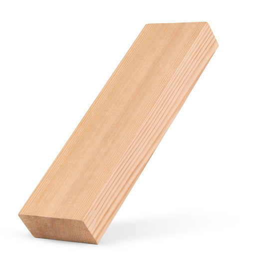 Western Red Cedar 2x4 bench board leaning at a slant, showing the face grain, edge and angled end