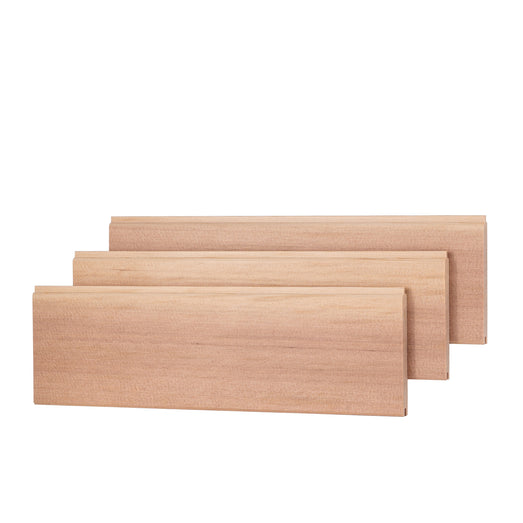 Three Western Red Cedar paneling boards staggered in a row, showing the face grain and the ends of each board