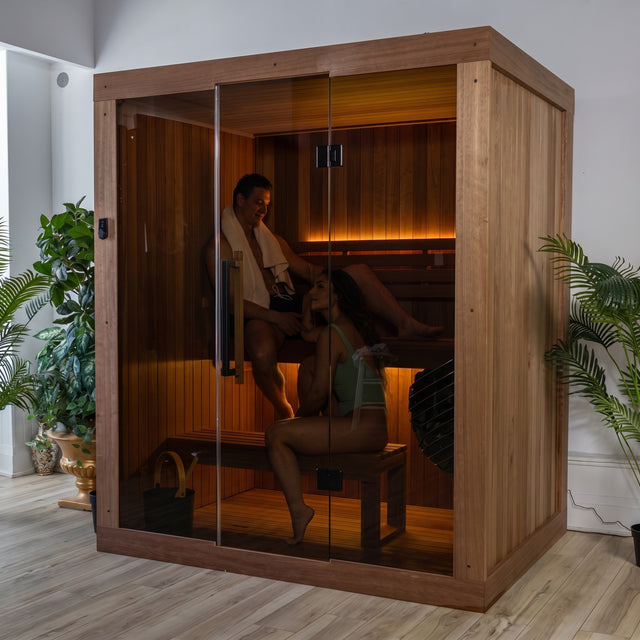 Dundalk Loft 3-person traditional indoor sauna with a couple relaxing inside
