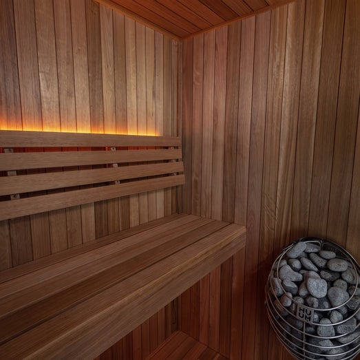 Interior of the Dundalk Loft sauna with two-tier Thermo Grandis benches and warm LED lighting