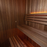 Dundalk Loft sauna interior with bench, water bucket and electric heater