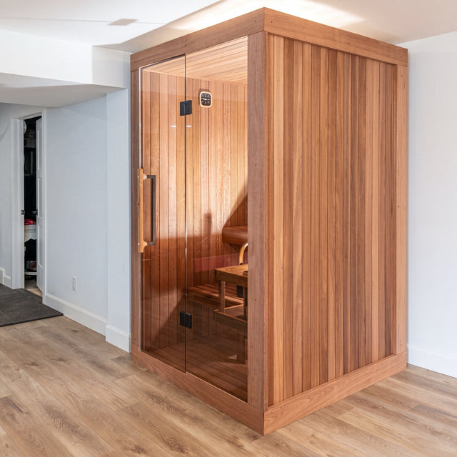 Dundalk Nook 2-person traditional indoor sauna with glass front in a modern room