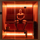 Person relaxing inside the Dundalk Studio traditional indoor sauna