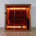Front view of the Dundalk Studio glass-front indoor sauna with warm glow