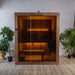 Angled exterior view of the Dundalk Studio indoor sauna with glass door