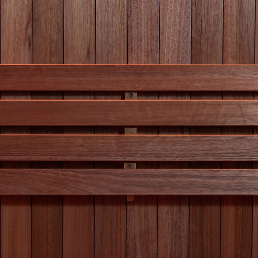 Dundalk Studio sauna interior with wide two-tier benches, backrests and warm LED lighting