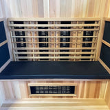 Close view of Finnmark FD-3 black cushion against light cedar sauna paneling
