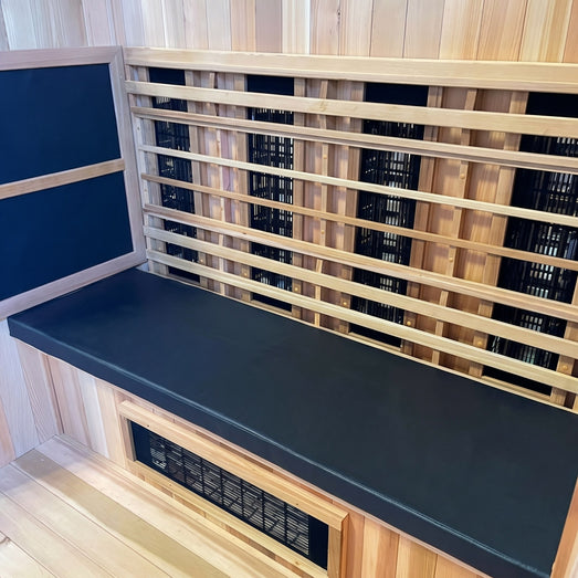 Finnmark FD-3 marine grade vinyl cushion centered on a cedar sauna bench