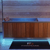 Front view of the Finnmark SoulCold plunge tub glowing under blue LED lighting