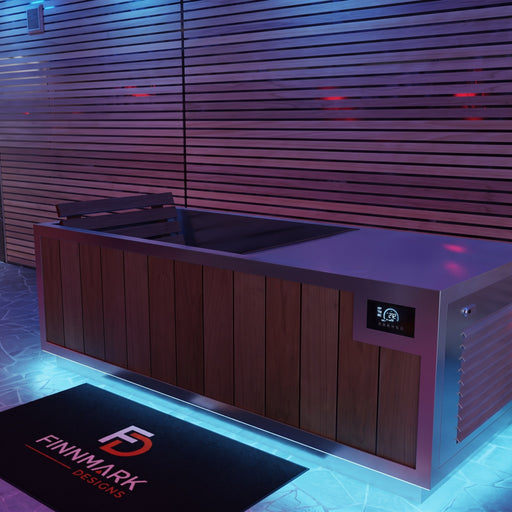 Finnmark SoulCold plunge tub with cedar backrest in a blue-lit home spa room