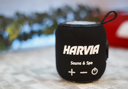 Black Harvia speaker from the front, showing the volume and power buttons