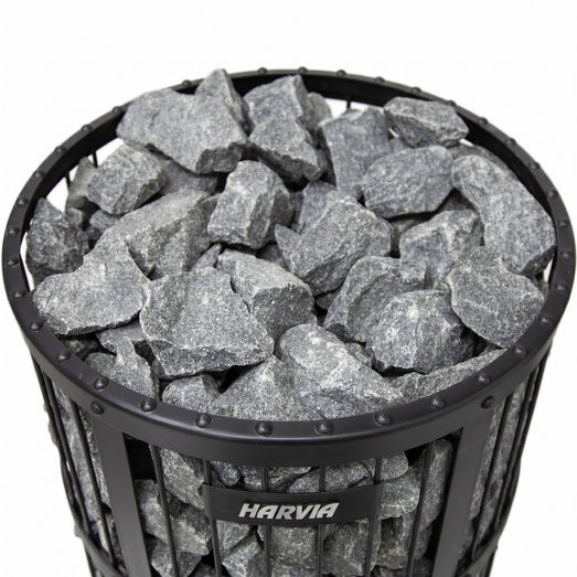 Top-down view of grey stones filling the Harvia Legend stove stone basket