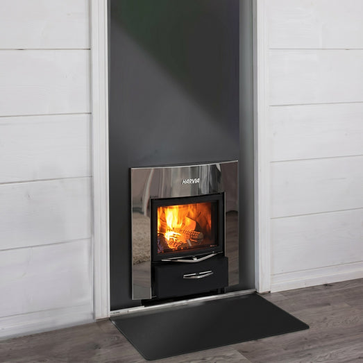 Close detail of the Harvia PRO 36 DUO wood-burning sauna stove in low light