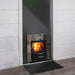 Close detail of the Harvia PRO 36 DUO wood-burning sauna stove in low light