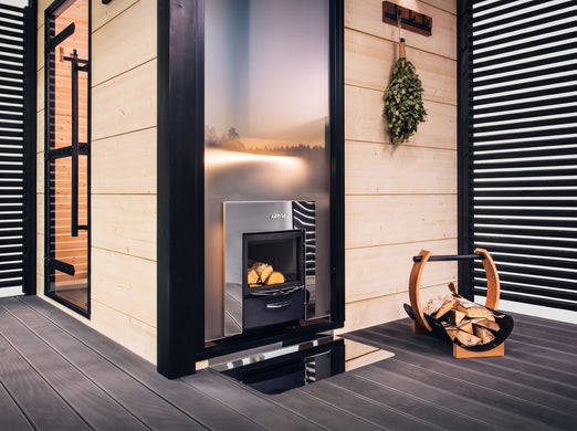 Harvia PRO 36 DUO wood-burning stove installed in a warm sauna room setting
