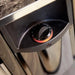 Close-up of the Harvia The Wall heater thermostat dial with its numbered scale