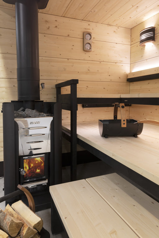 Harvia WL550 protective sheath around a Harvia Pro 20 wood-burning stove in a sauna