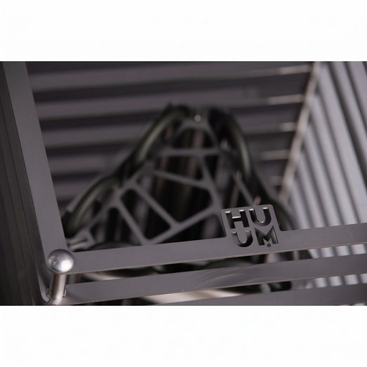 HUUM CLIFF 10.5kW heater detail showing brand mark on the steel cage