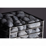 HUUM CLIFF 10.5kW heater top corner with dark grey stones on dark backdrop
