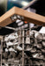 Close-up of the HUUM Cliff heater mounting bracket beneath a sauna bench