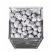 Speckled granite stones filling the top of the HUUM Cliff sauna heater