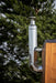 HUUM thru-wall stainless chimney installed on a cedar outdoor sauna exterior