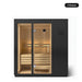 3 person Kohler C1 Graphite Grey indoor sauna, front view with the glass door closed