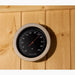 Kohler wall-mounted sauna thermometer on Scandinavian spruce panelling