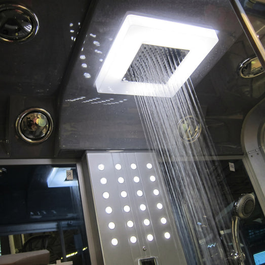 Mesa 500XL steam shower lit rainfall ceiling head running over body jets