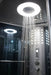 Mesa 802L steam shower rainfall heads running with LED-lit ceiling and panel