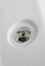 Detail of a chrome whirlpool jet fitting set into the white Mesa 807A tub