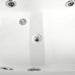 Close detail of chrome whirlpool jets inside the white Mesa 807A tub