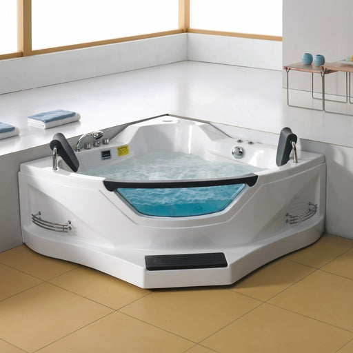 Mesa BT-084 corner whirlpool tub installed in a tiled bathroom corner