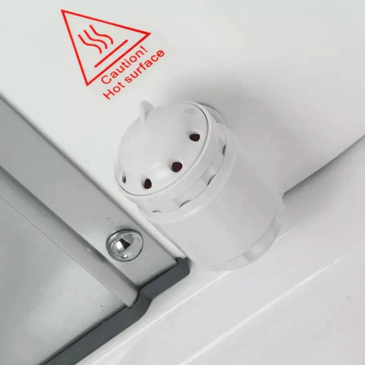 Mesa WS-609A steam outlet beside red Caution Hot Surface warning label