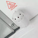 Mesa WS-609A steam outlet beside red Caution Hot Surface warning label