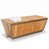 Dundalk Polar Cold Plunge Tub with cedar slat cover closed and rolled towels on top