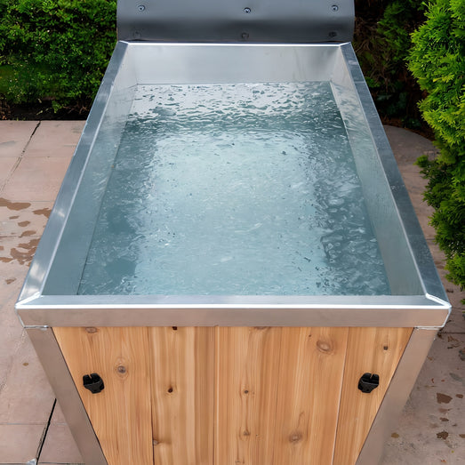Top-down view of the Polar Cold Plunge Tub filled with cold water on an outdoor patio