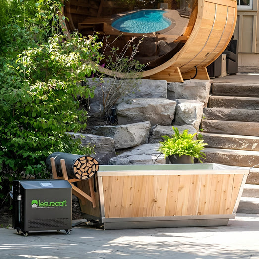 Polar Cold Plunge Tub and Leisurecraft chiller in a landscaped backyard beside a barrel sauna