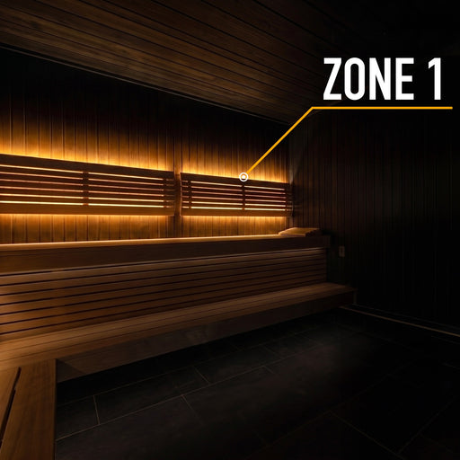 ProSaunas 1-Zone Dimmable White LED Sauna Light Kit lighting the backrest of a dark sauna bench as a single zone