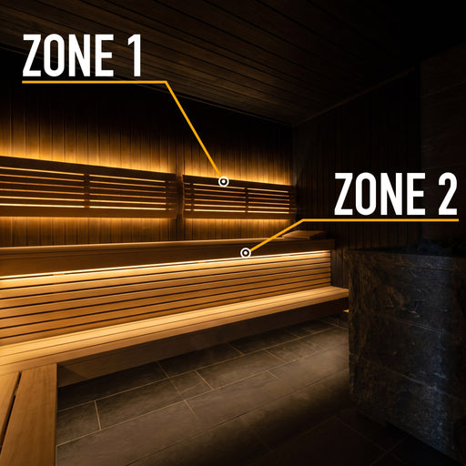 ProSaunas 2-Zone Dimmable White LED Sauna Light Kit with zone 1 on the backrest and zone 2 under the bench of a dark sauna