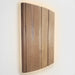 SaunaLife E6 curved wooden sconce light shade shown front-on against wall