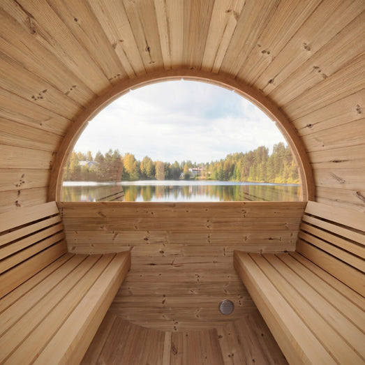 SaunaLife E7 sauna interior benches facing panoramic rear window over a lake