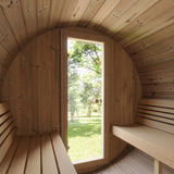 SaunaLife E7 sauna interior facing the glass door with green garden view outside