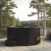 SaunaLife S6 black hot tub on a forest deck with a lake view