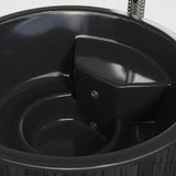 Interior of black SaunaLife S6 hot tub showing seating and footwell