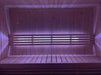 SaunaLife X7MOOD LED lighting in magenta illuminating a sauna interior