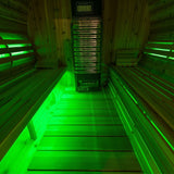 SaunaLumin double bench set lighting a cedar sauna interior in green RGB color